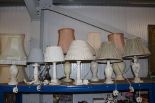 A large quantity of table lamps