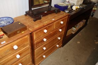 A hardwood chest fitted two short over three long drawers