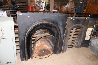 A cast iron fireplace and surround