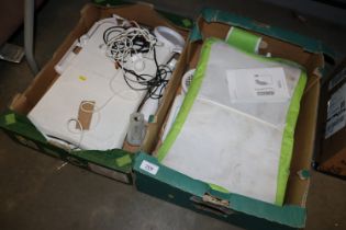 Two boxes containing Wii boards and various access