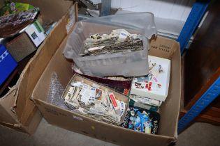 A box containing various cigarette cards