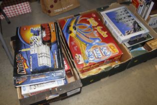 Three boxes containing various board games, puzzle