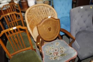 A cane armchair together with an upholstered cane b