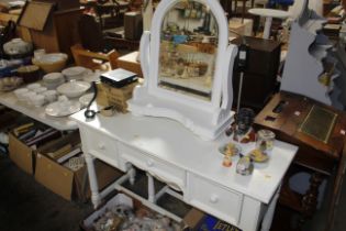 A white painted dressing table fitted three drawer