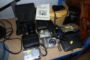 A quantity of various cameras to include Olympus,