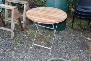 A wooden and metal folding garden table