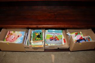 Four boxes containing children's books