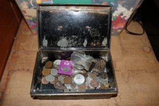 A tin containing various coinage to include Crowns