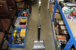A GTECH cordless vacuum cleaner lacking charger