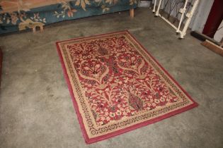 An approx. 5'7" x 3'10" Carmel rug