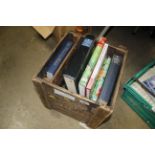 A crate containing various books
