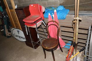 A metal framed high chair; two children's chairs;