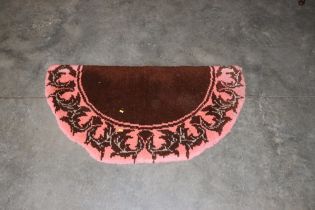 A semi circular hearth rug