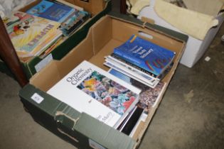 A box containing various books