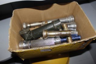 A box of vintage torches