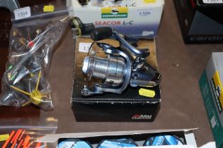 An Abu Garcia Cardinal 103 fishing reel