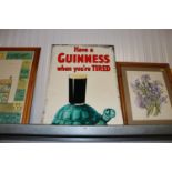 A reproduction "Guinness" sign