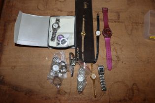 A quantity of wrist watches to include a Swatch, A