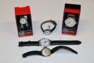 A box of Timex and other wrist watches