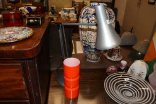 A Habitat orange glass table lamp and a Angle Pois