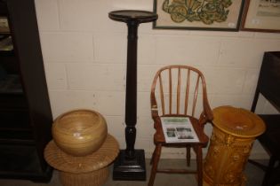 A mahogany fluted torchere stand