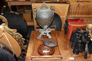 A twin handled tray; a copper samovar; and a silve