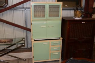 A post war utility kitchen dresser