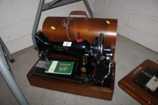 A Singer hand sewing machine