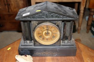A slate two hole mantel clock