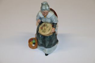 A Royal Doulton figurine "Embroidering" HN2855