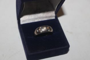 A 925 silver ring set with white stones, rings siz