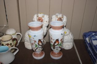 A pair of Victorian Staffordshire spaniels and a p