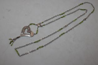A 38" Sterling silver, peridot and mother of pearl