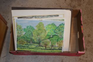 A box of various unframed artwork to include water