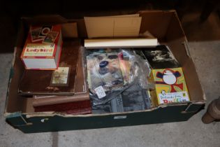 A box containing various post-cards, cigarette car