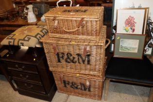 A pair of Fortnum & Masons wicker baskets and one