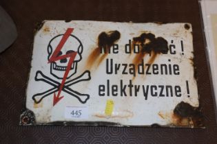 A Polish warning sign "Fence Electrified"