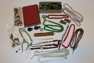 A box of various costume jewellery to include bead