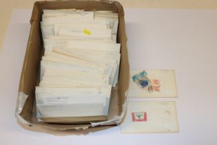 A box of stamps and The Dictionary of Stamps in Co