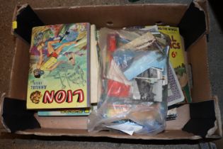 A box of children's books, post-cards, theatre pro