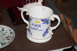 A large Victorian blue and white loving cup dated