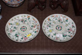 A pair of Chinese famille rose plates