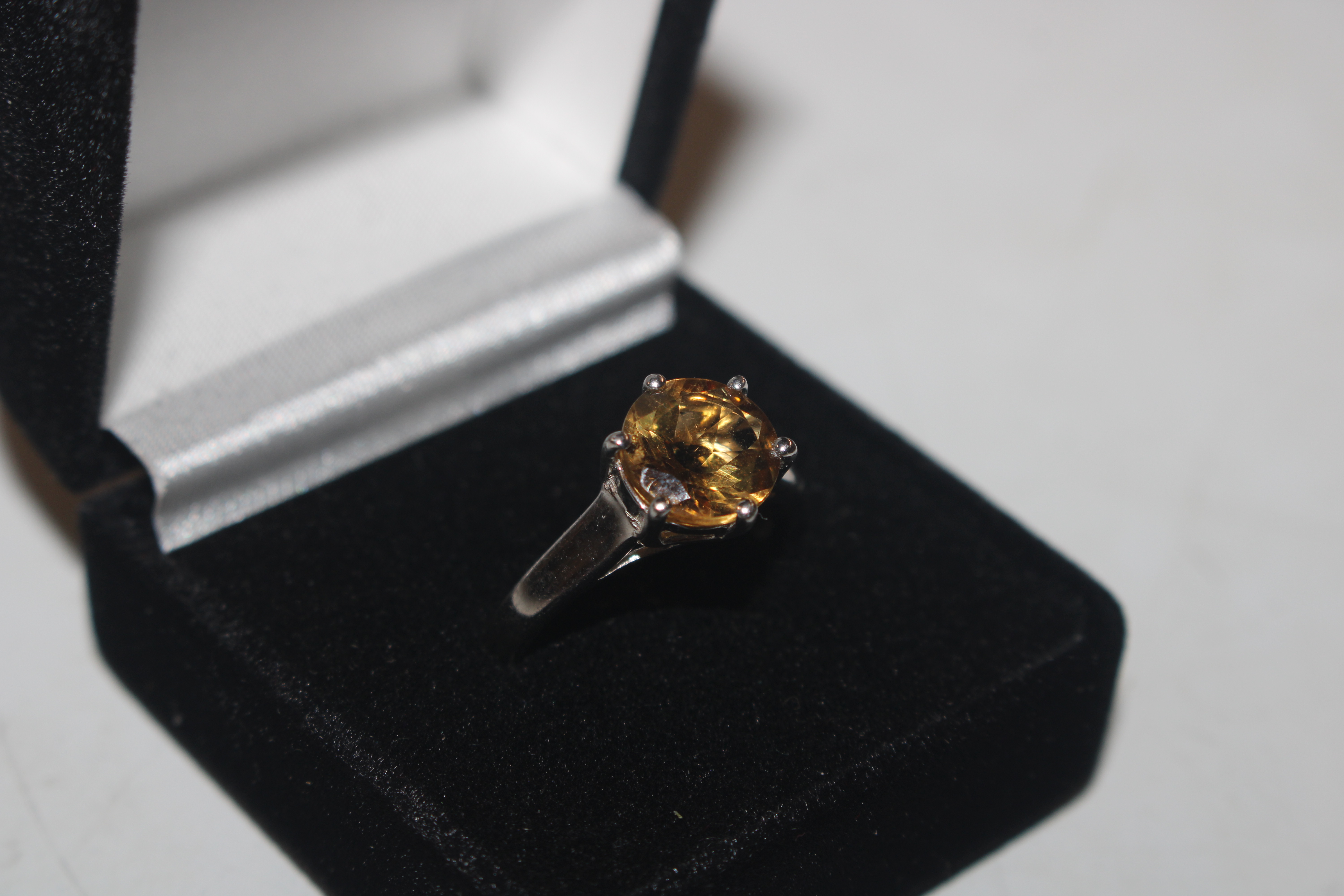 A 925 silver ring set with citrine coloured stone