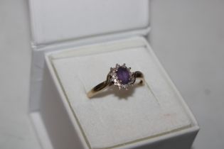 A 9ct gold amethyst and diamond set ring, ring size T, approx. total weight 1.5gms