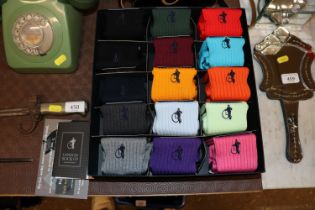 A box of as new London Socks Co. socks containing