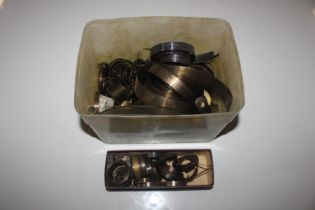 A box of clock spares including springs