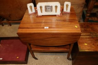 A teak drop leaf tea trolley