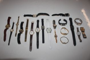 A basket pf various wrist watches