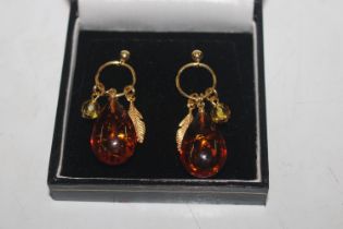 A pair of gilt Sterling silver and amber ear-ring