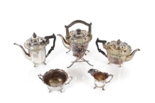 A plated five piece tea set with floral scroll dec